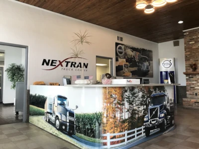 Custom Office Signs Transforms Nextran Truck Center’s Lobby